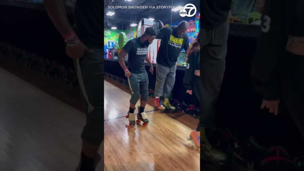 Shaquille O’Neal holds on as coach gives roller-skating tips