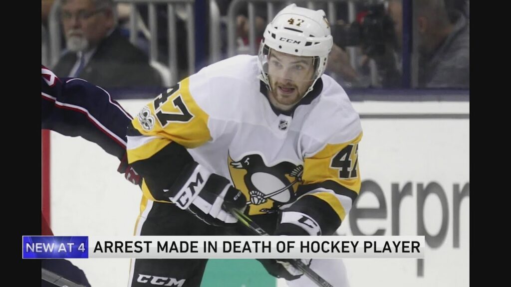 Man arrested in death of hockey player whose neck was cut with skate blade during game