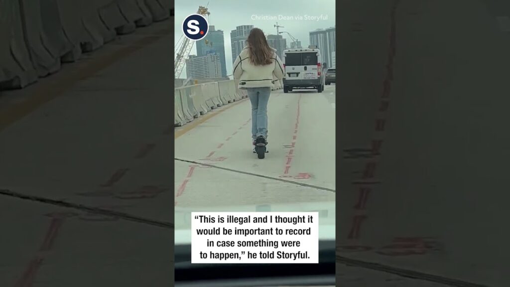 Woman Rides Scooter on Miami Highway